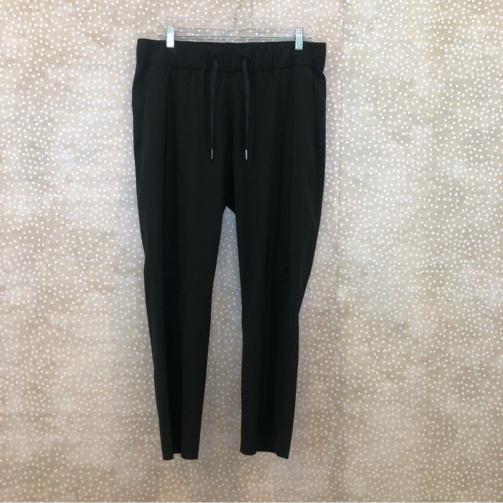 Lululemon On The Fly Pant 28” Black Size 10 Drawstring Pockets Style W5AHOS